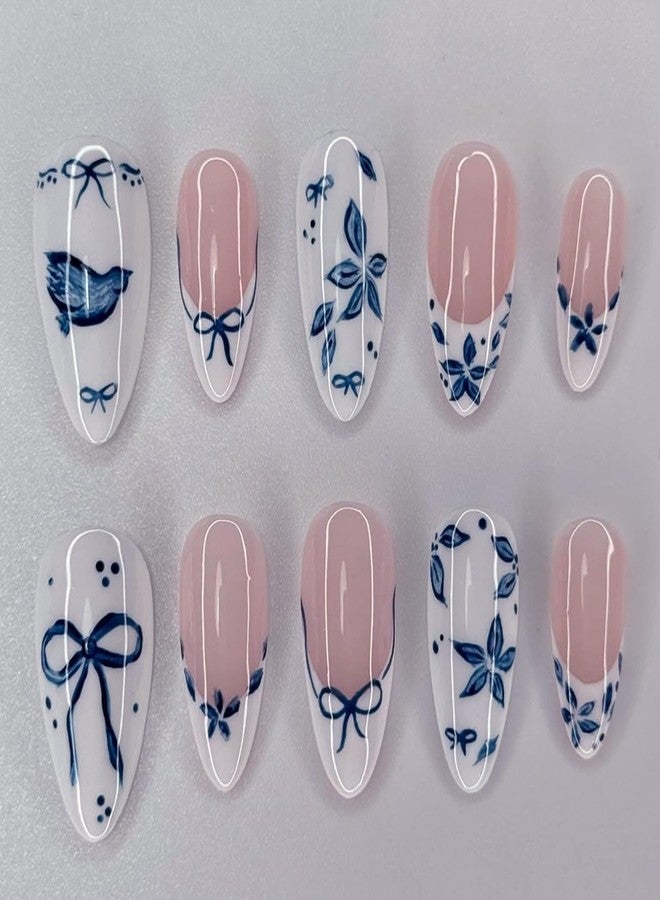OSTTMA 24Pcs French Press on Nails Medium Almond Fake Nails Blue Flower Bow Nail Art Designs Floral Acrylic Nails Full Cover Flowers False Nail Tips Reusable Glue on Nails for Women Manicure Decoration - Image 1